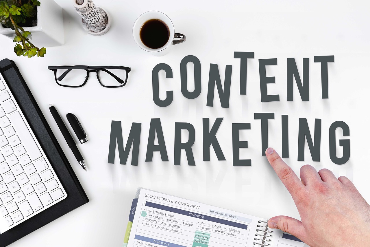 Content marketing letters on the table with coffee and glasses